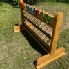 wooden freestanding welly rack with coat pegs